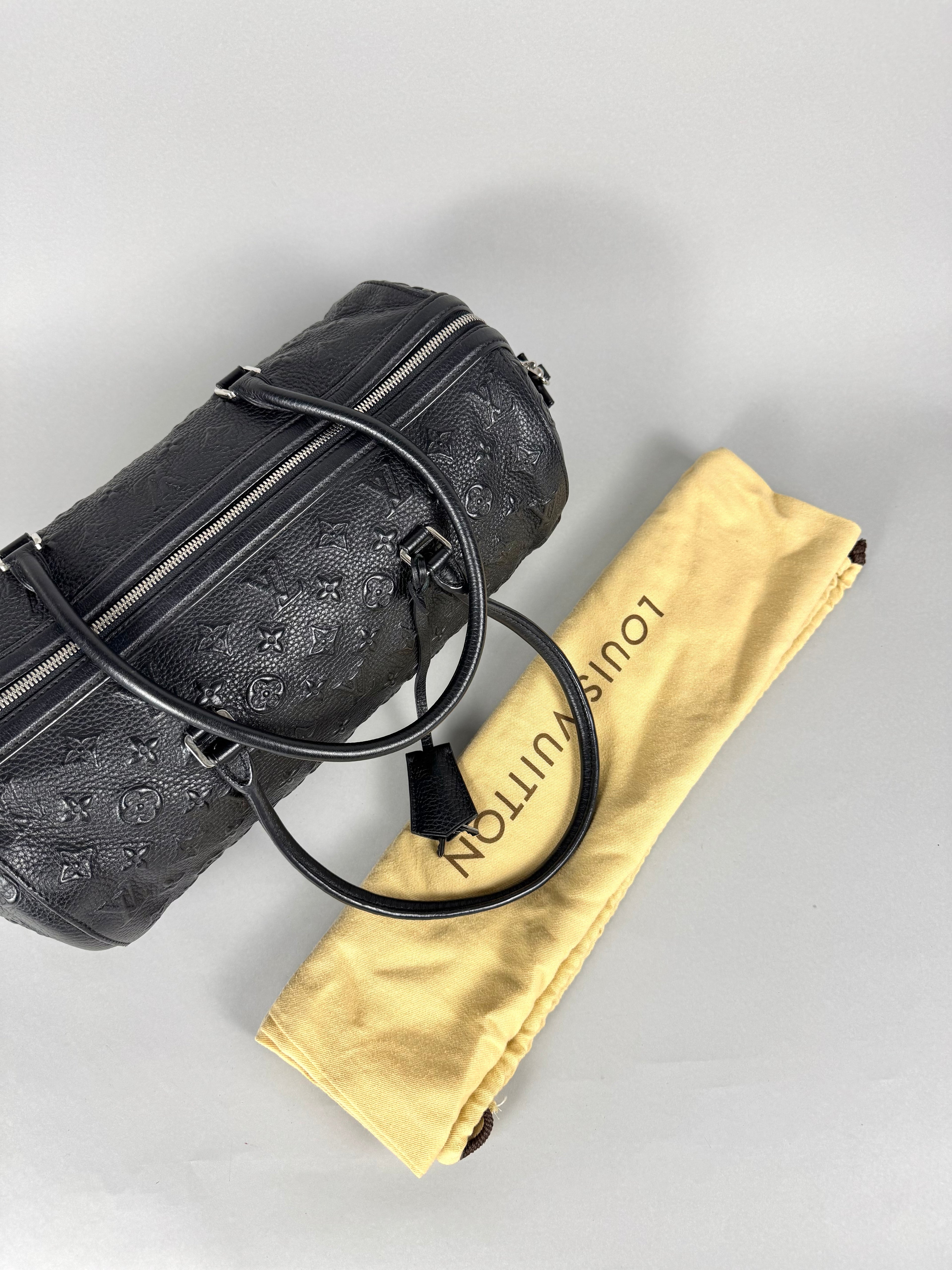 Louis Vuitton Black Monogram Revelation Neo Papillon GM