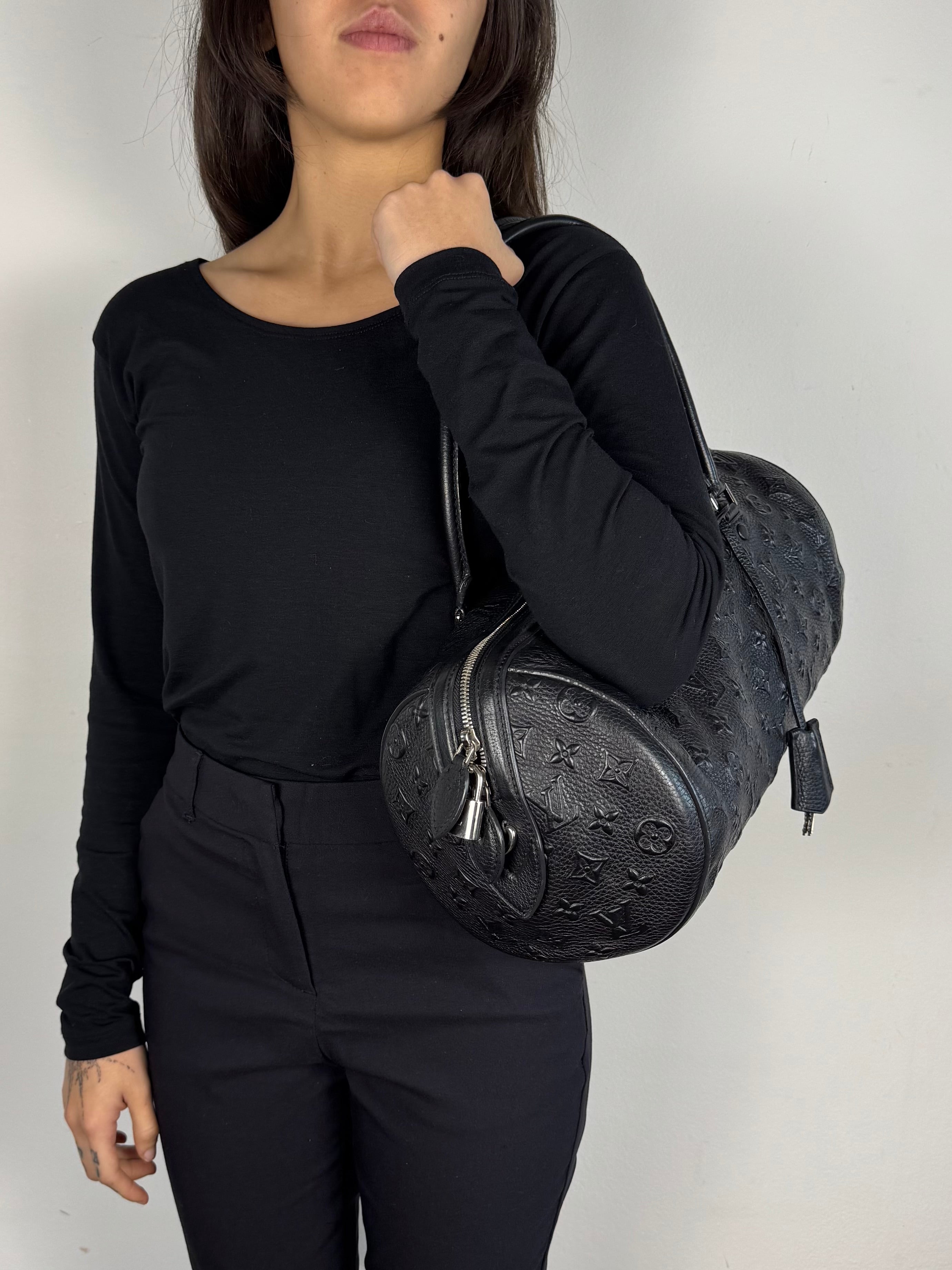 Louis Vuitton Black Monogram Revelation Neo Papillon GM