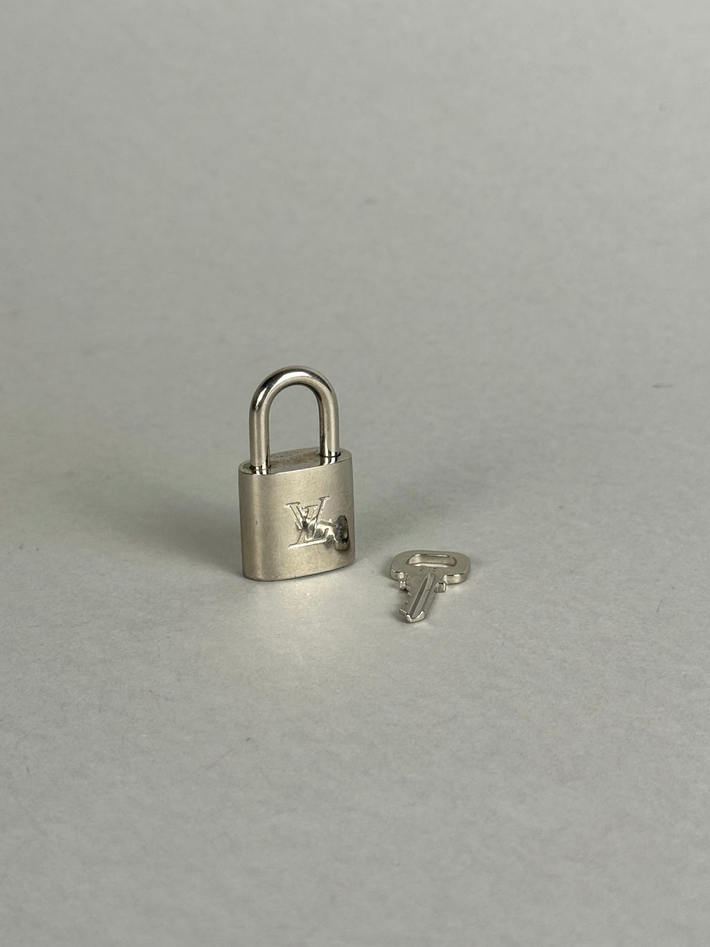 Louis Vuitton Padlock Silver