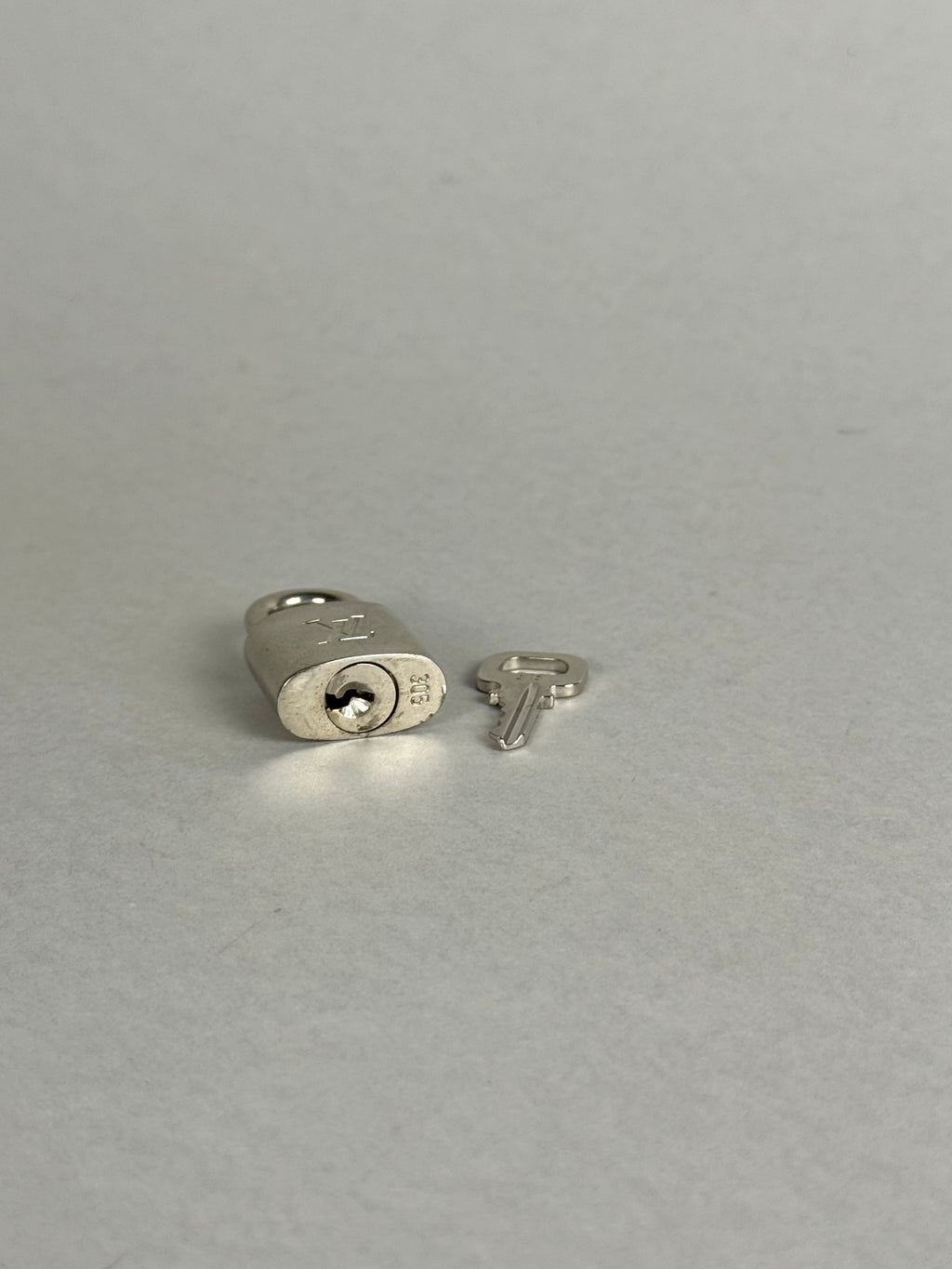 Louis Vuitton Padlock Silver